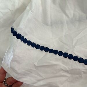 Twin bedskirt from pottery barn teen, white with navy embroidered dots.